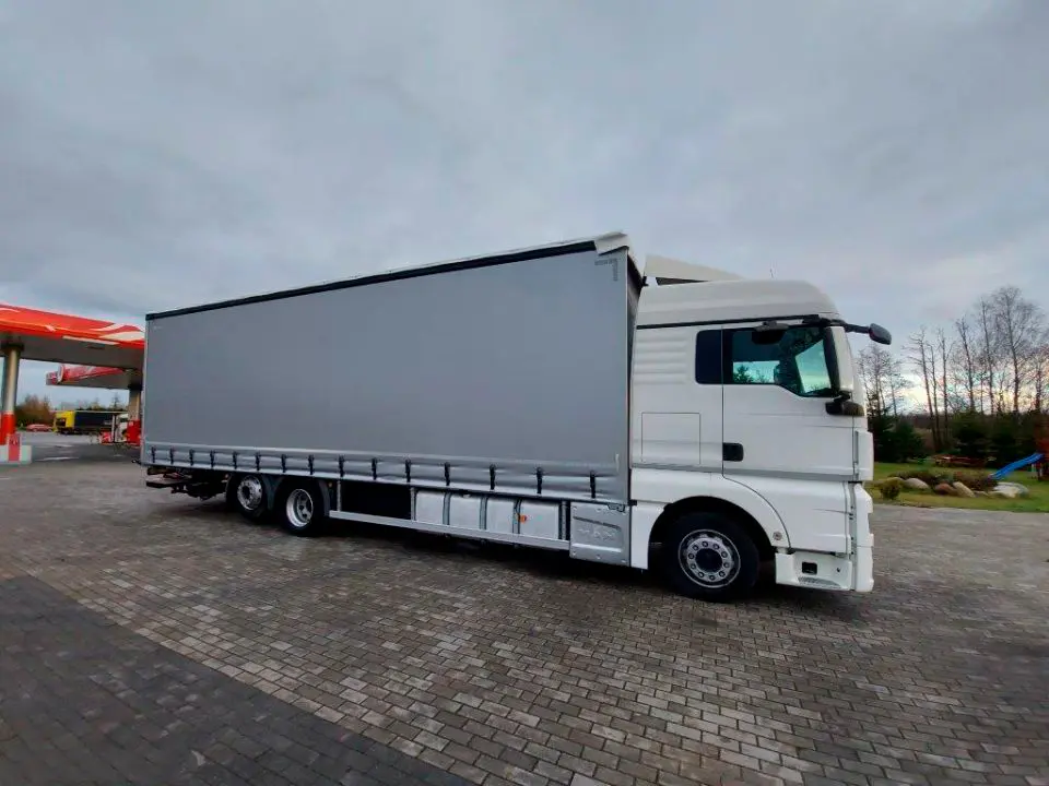 Кубовик MAN TGX 26.440, 6х2, 2015 год, штора 71 куб, 24 европалета, гидроборт, без пробега по РФ - фото 15