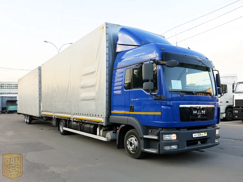 Автопоезд 130м3 борт-тент, г/п 10т, MAN TGL + прицеп, 2 спальника, 2011  г.в. - фото