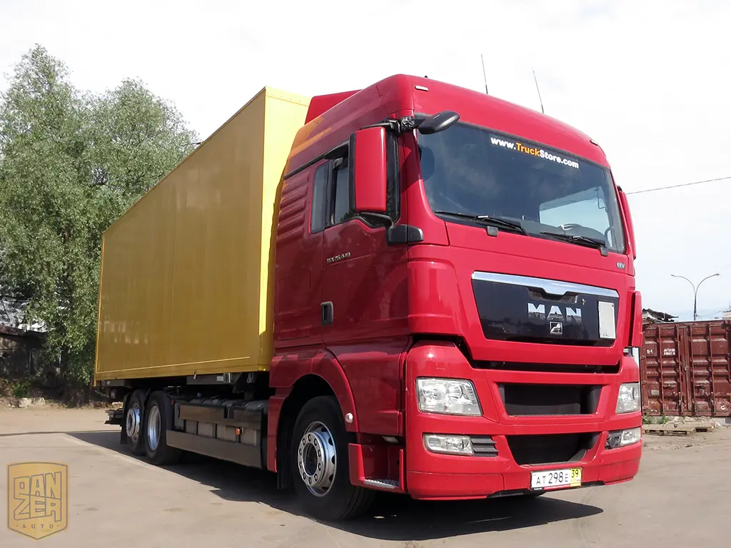 MAN TGX 26.440, 2011г, 6х2, 50м3 фургон, г/п 16т, ворота + гидролифт, высокая кабина - фото 8