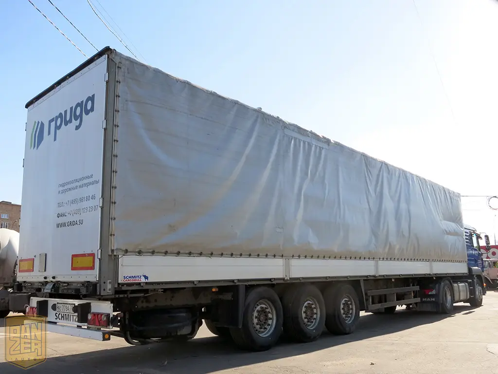 Тягач MAN TGA 18.480 с полуприцепом Schmitz S01, сдвижной тент 92 м3 - фото