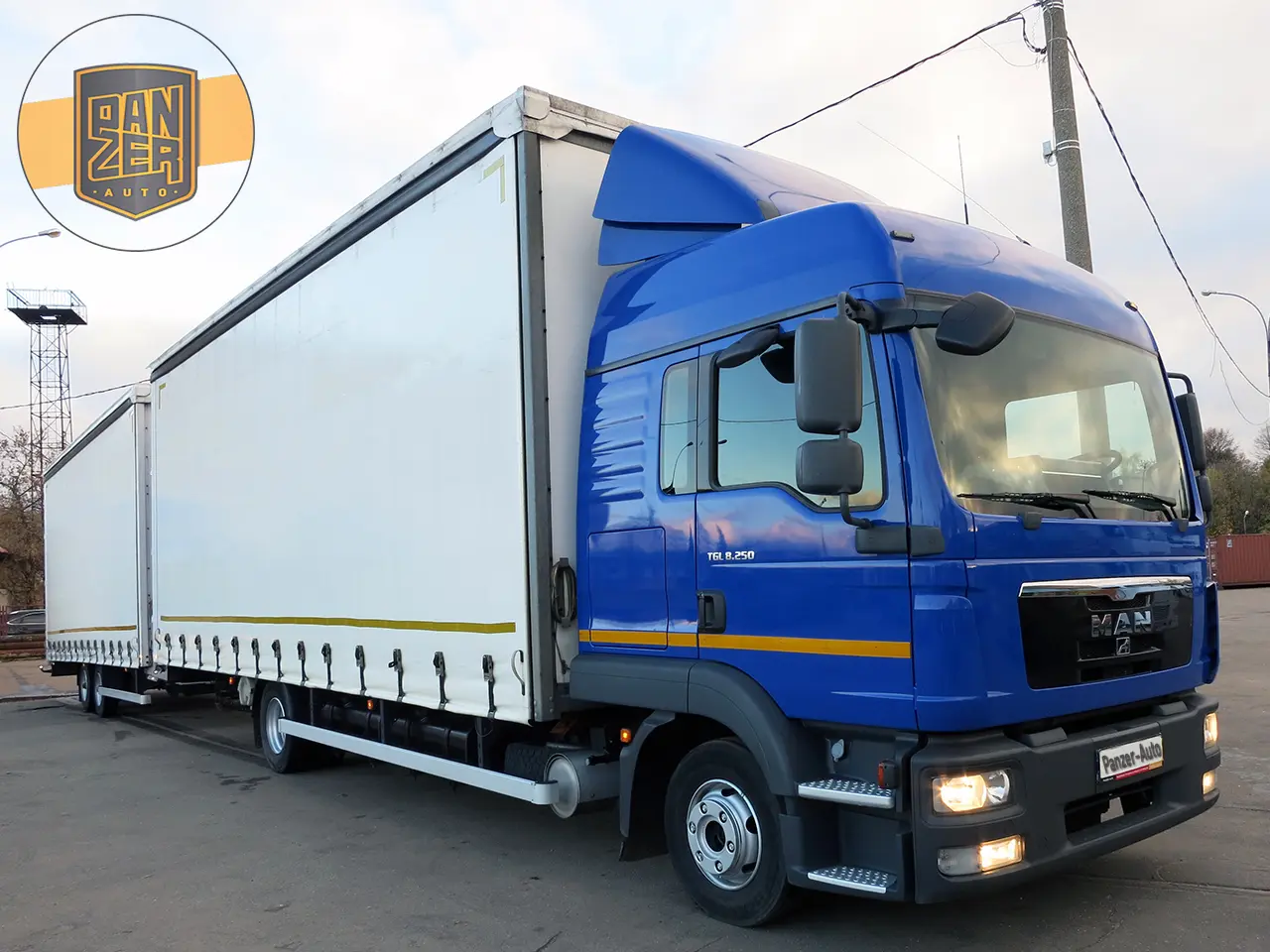 Автопоезд МАН ТГЛ 8.250 120 кубов шторный с воротами, 2013 год, без ПЛАТОНа, без пробега по РФ - фото 8