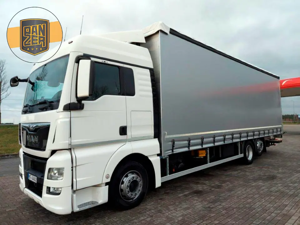 Кубовик MAN TGX 26.440, 6х2, 2015 год, штора 71 куб, 24 европалета, гидроборт, без пробега по РФ - фото