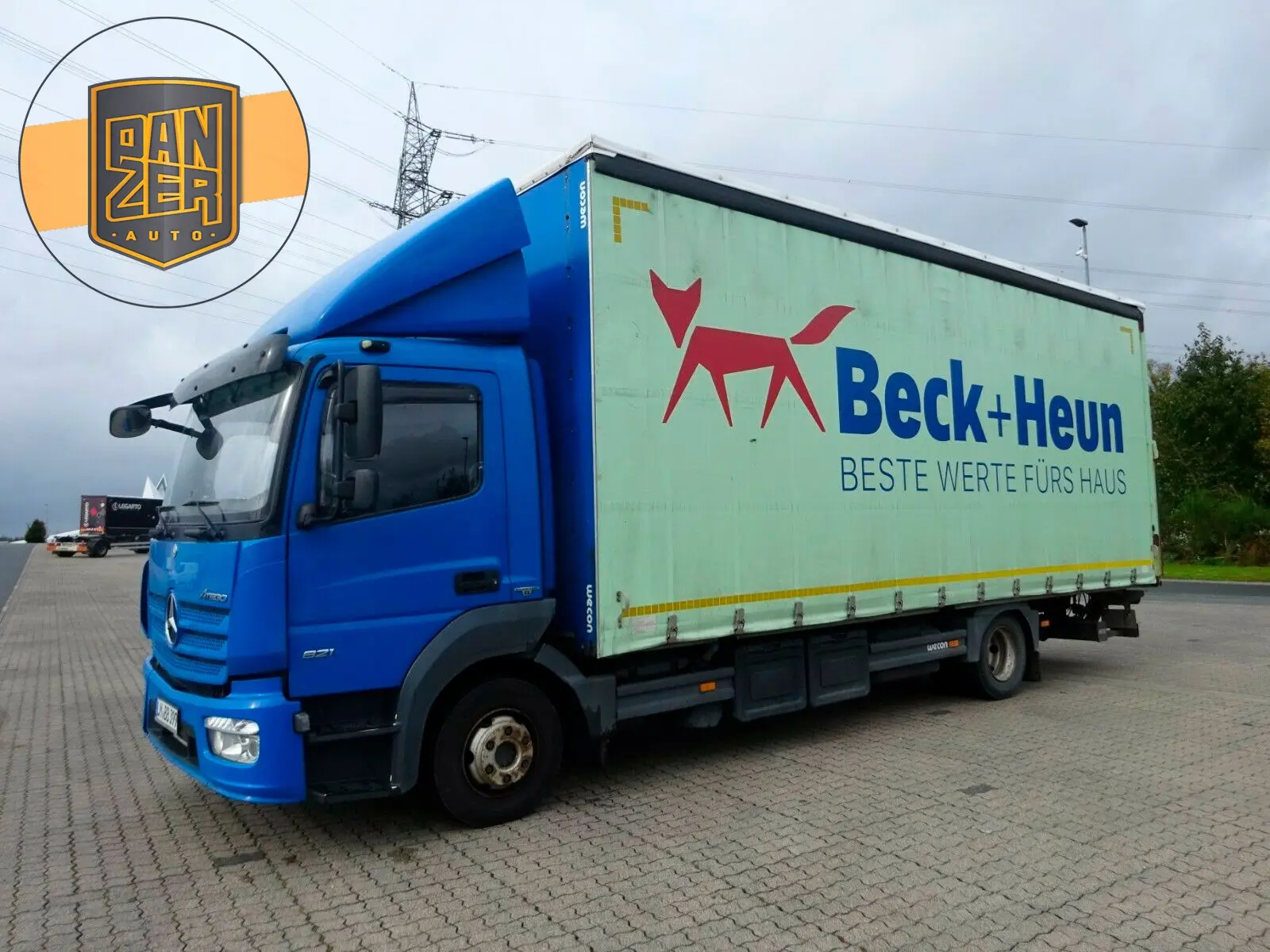 Mercedes Atego 821 L, 2014 год, штора 48 кубов с гидробортом, сдвижной верх, без пробега по РФ - фото