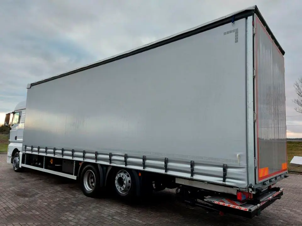 Кубовик MAN TGX 26.440, 6х2, 2015 год, штора 71 куб, 24 европалета, гидроборт, без пробега по РФ - фото 9