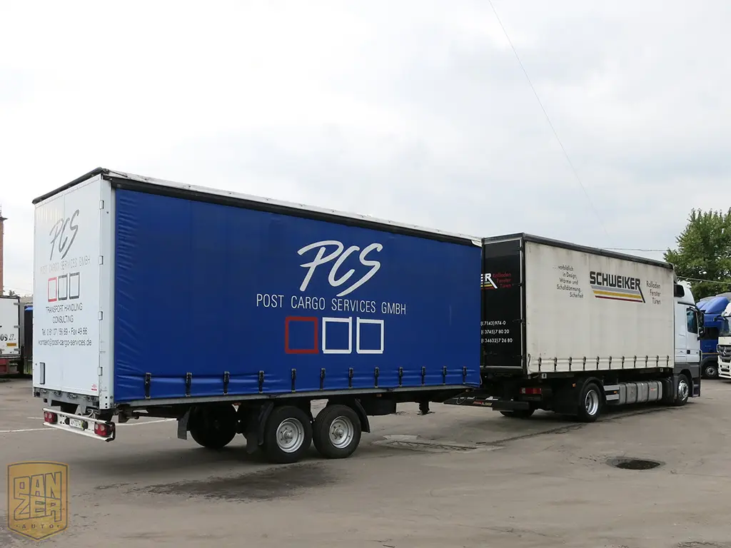 Автопоезд Mercedes Actros тентованный, 100 кубов, г/п 20 тонн. 2010 г. Без пробега по РФ! - фото