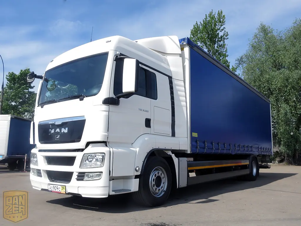 MAN TGS 18.320,  штора 60м3, 10 тонник, 22 палеты, состояние нового - фото