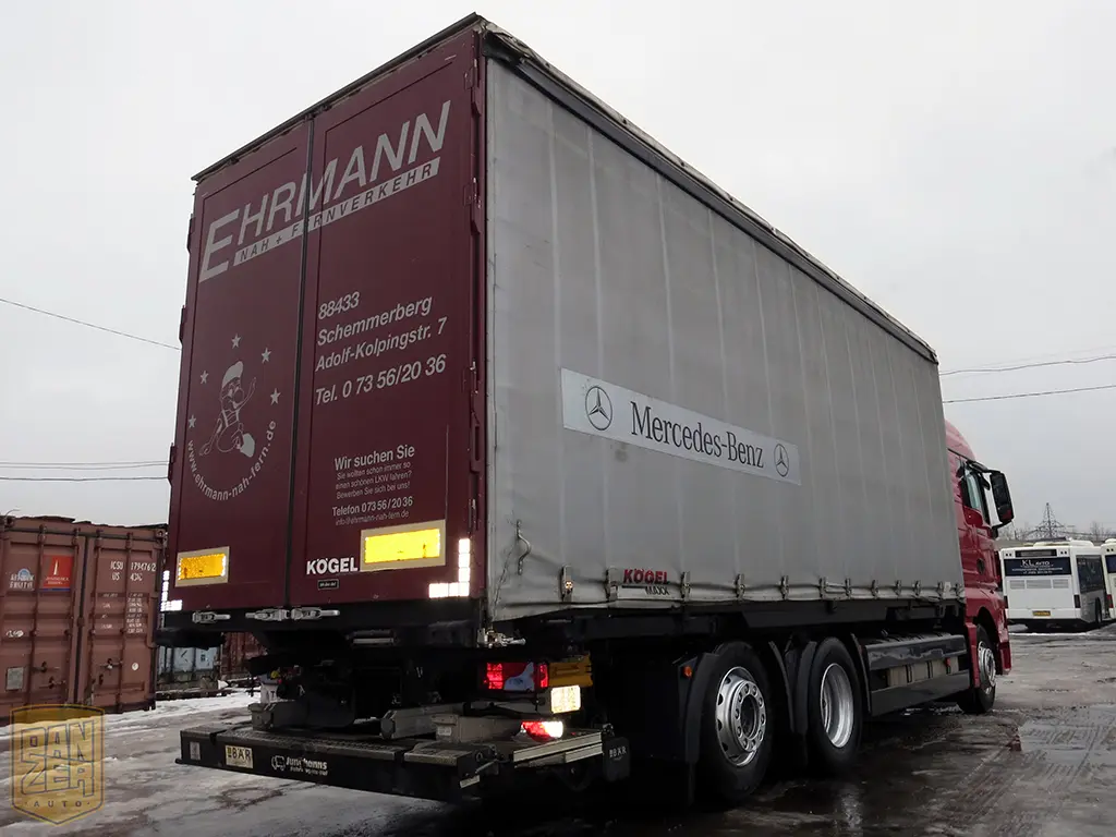 MAN TGX 26.440, тент-штора 52м3, 6х2, 16 тонн, 2011г, высокая кабина - фото