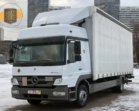 Грузовик тентованный Mercedes Atego 1224, 2012 год | photo 0