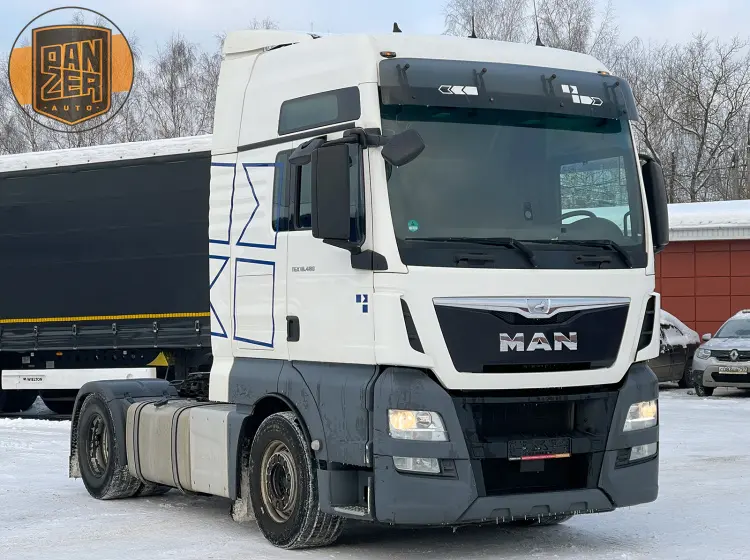 MAN TGX 18.480 тягач 4х2, XXL кабина, 2 бака - фото-детальных