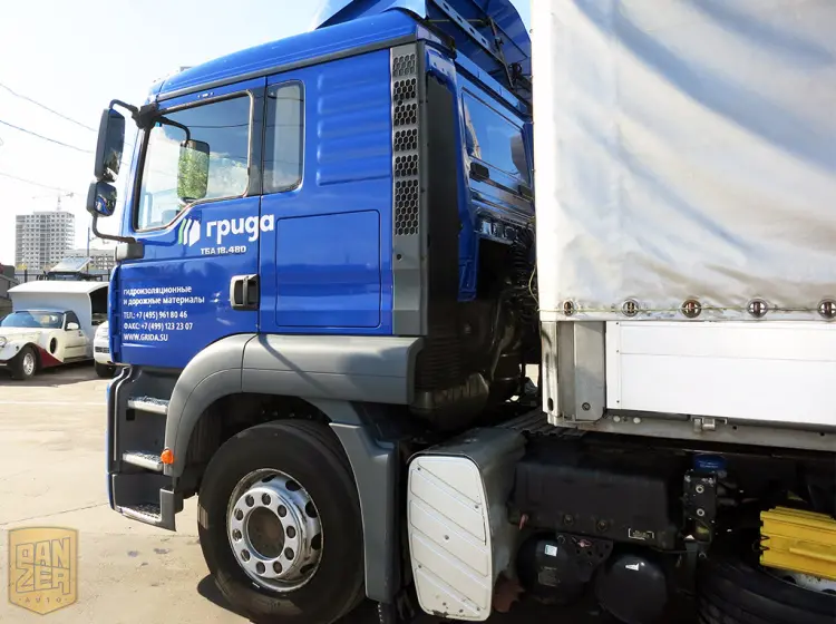 Тягач MAN TGA 18.480 с полуприцепом Schmitz S01, сдвижной тент 92 м3 - фото 7