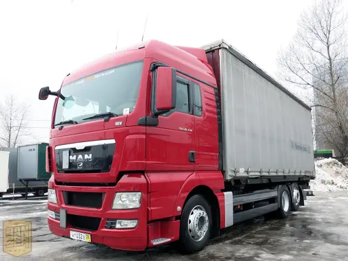 MAN TGX 26.440, тент-штора 52м3, 6х2, 16 тонн, 2011г, высокая кабина - фото