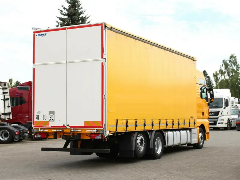 Грузовик тентованный MAN TGX 26.440, 2015 год | photo 1