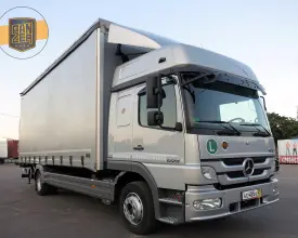 Грузовик тентованный Mercedes Atego 1229, 2013 год | photo 0