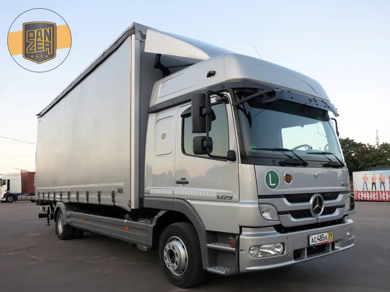 Грузовик тентованный Mercedes Atego 1229, 2013 год | photo 0
