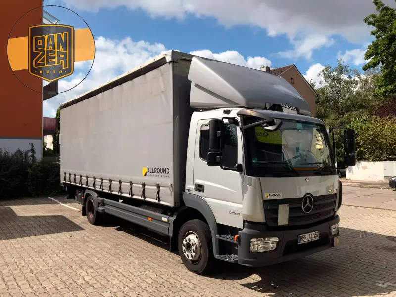 Грузовик тентованный Mercedes Atego 1224, 2014 год | photo 0