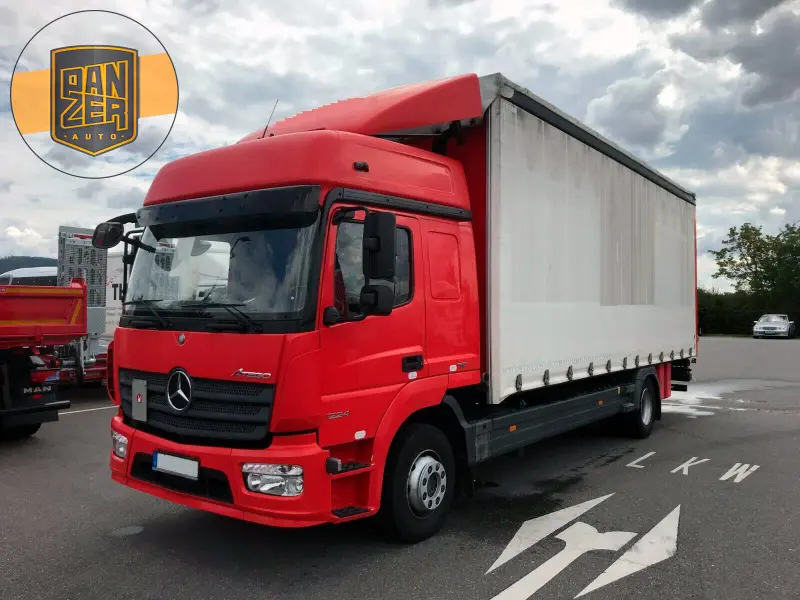 Грузовик тентованный Mercedes Atego 1224, 2014 год | photo 0