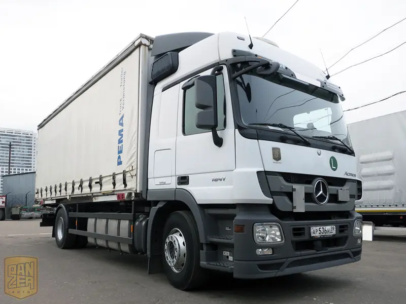 Грузовик тентованный Mercedes Actros 1841, 2010 год | photo 0