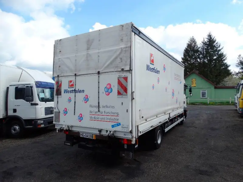 Грузовик тентованный MAN TGL 8.250, 2010 год | photo 1