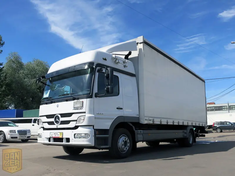 Грузовик тентованный Mercedes Atego 1229, 2012 год | photo 0