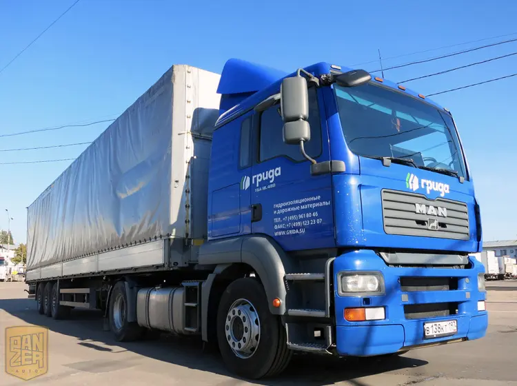 Тягач MAN TGA 18.480 с полуприцепом Schmitz S01, сдвижной тент 92 м3 - фото 8