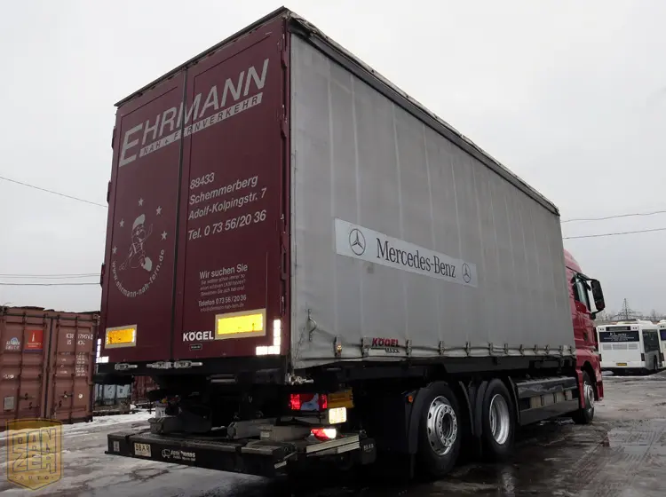 MAN TGX 26.440, тент-штора 52м3, 6х2, 16 тонн, 2011г, высокая кабина - фото