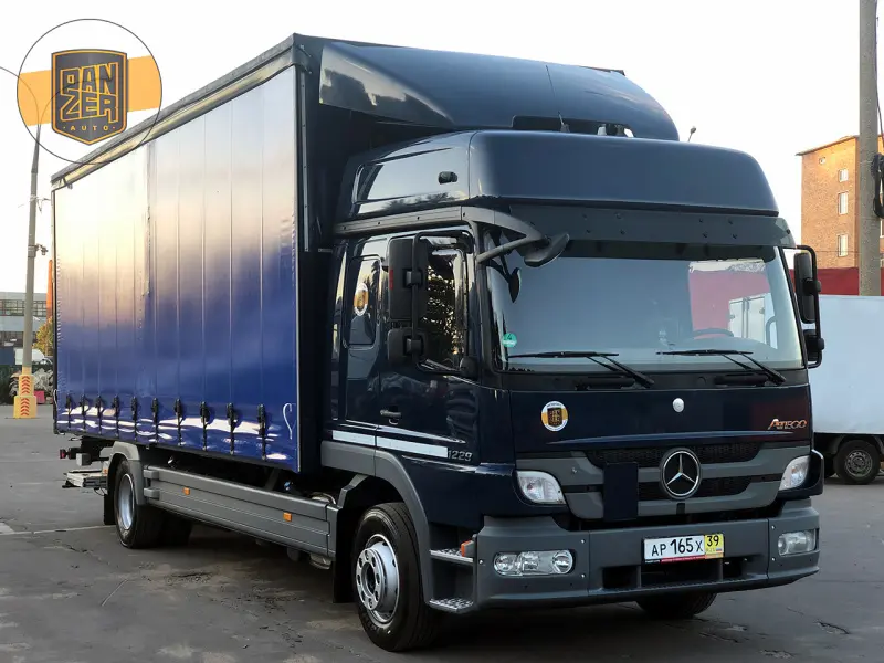Грузовик тентованный Mercedes Atego 1229, 2012 год | photo 0