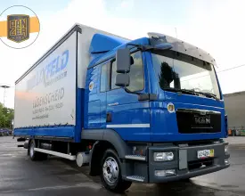 Грузовик тентованный MAN TGL 12.220, 2011 год | photo 0