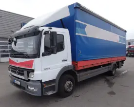 Грузовик тентованный Mercedes Atego 1224, 2010 год | photo 0