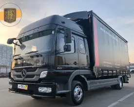 Грузовик тентованный Mercedes Atego 822, 2013 год | photo 0