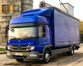 Грузовик тентованный Mercedes Atego 1224, 2013 год | photo 0