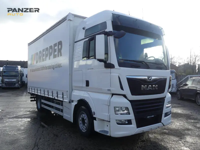 Грузовик тентованный MAN TGX 18.500, 2018 год | photo 0
